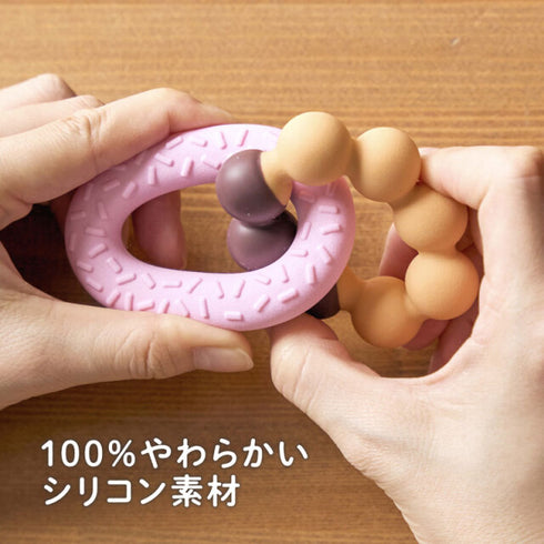 カミカミBaby よくばりドーナツ ドーナツが2つつながったシリコン素材の歯がため　色で違う硬さを楽しめる